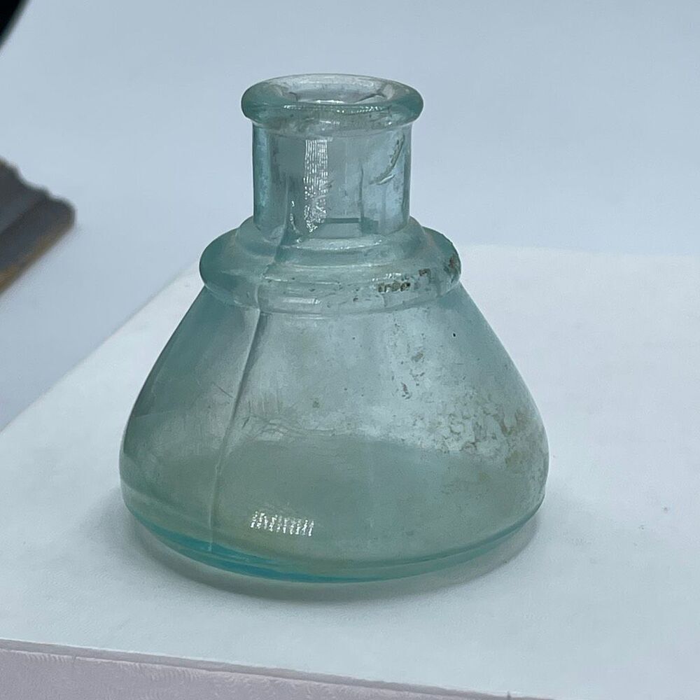 Antique Aqua -colored glass ink bottle Victorian era. Conical or umbrella shaped